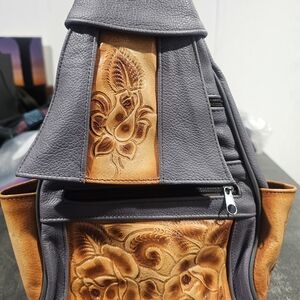 Gray and Tan Embossed Leather Backpack